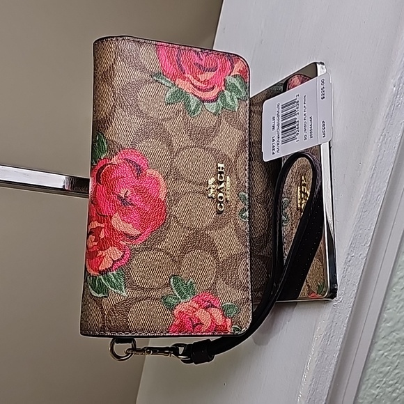 Coach Handbags - Coach F39191 Jumbo Floral Signature Foldover Flap Phone Wristlet NWT
